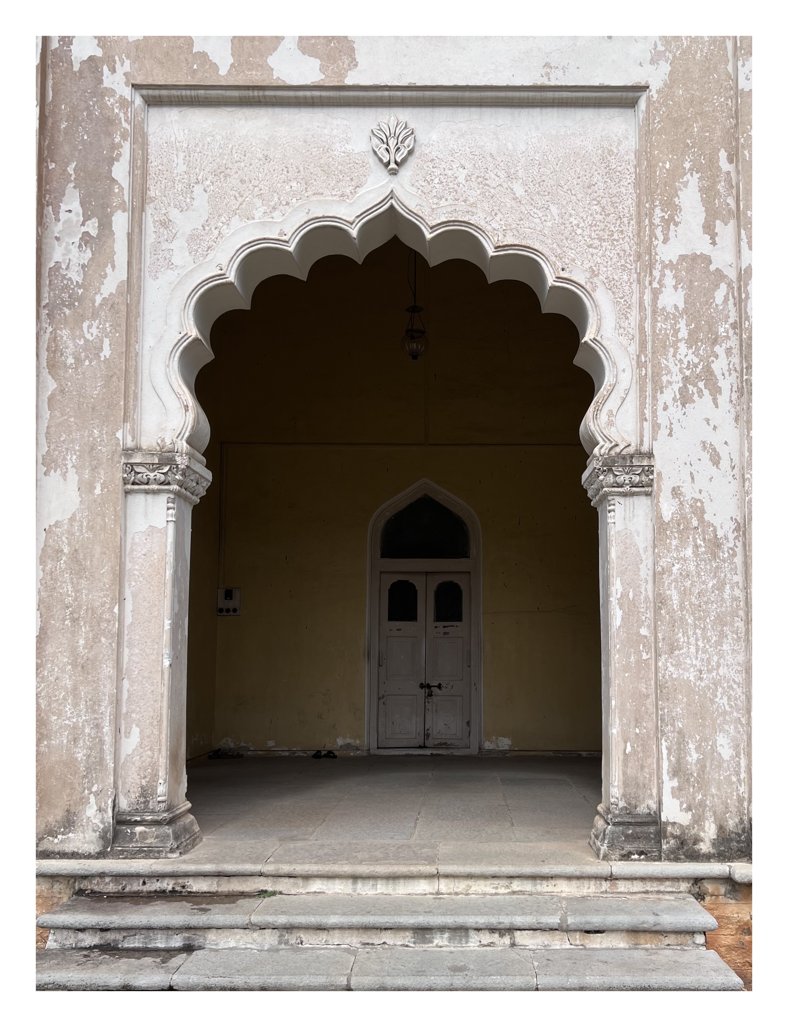 somewhat tattered arch of Mahtab Mahal