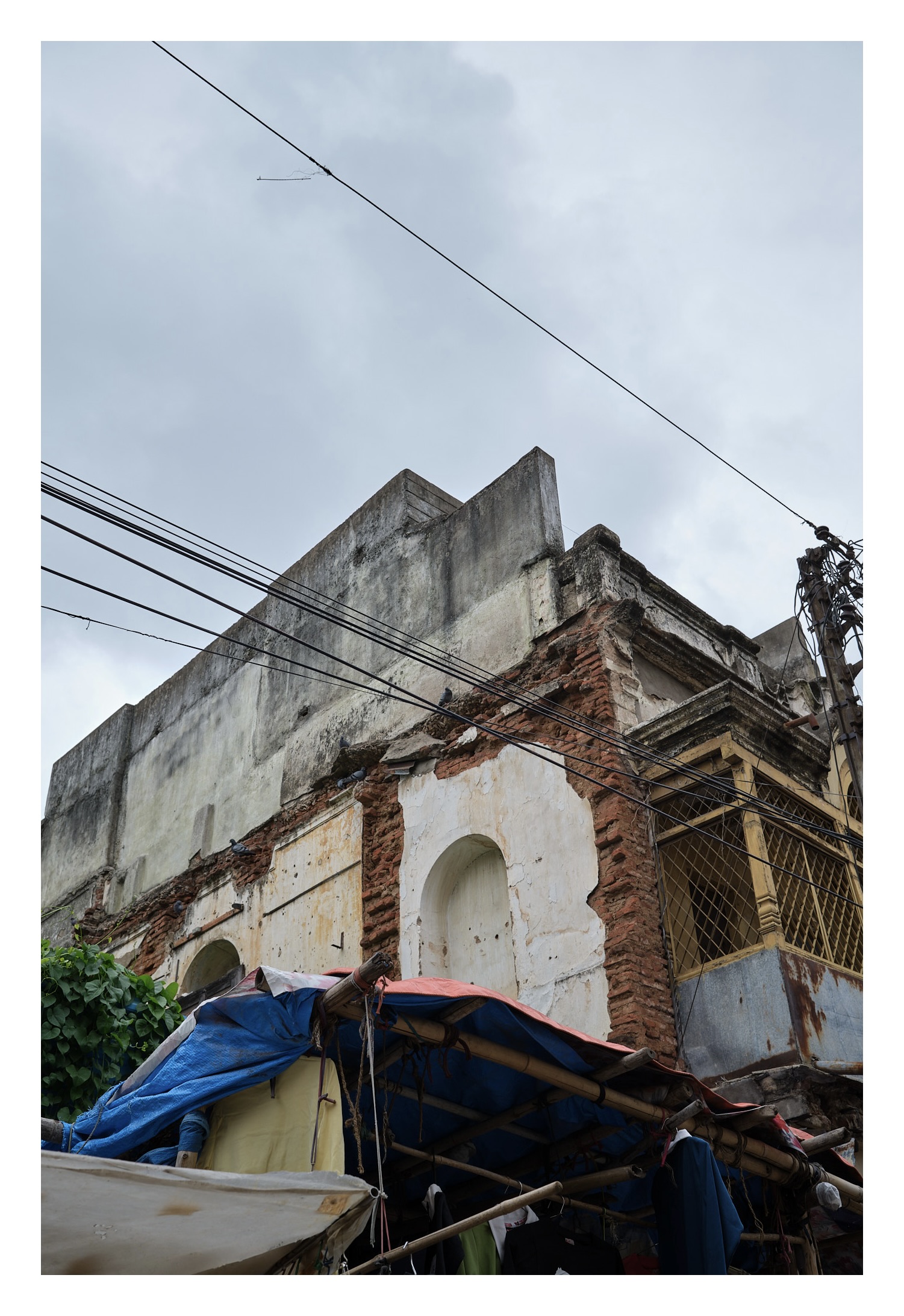 destroyed building where bricks are visible