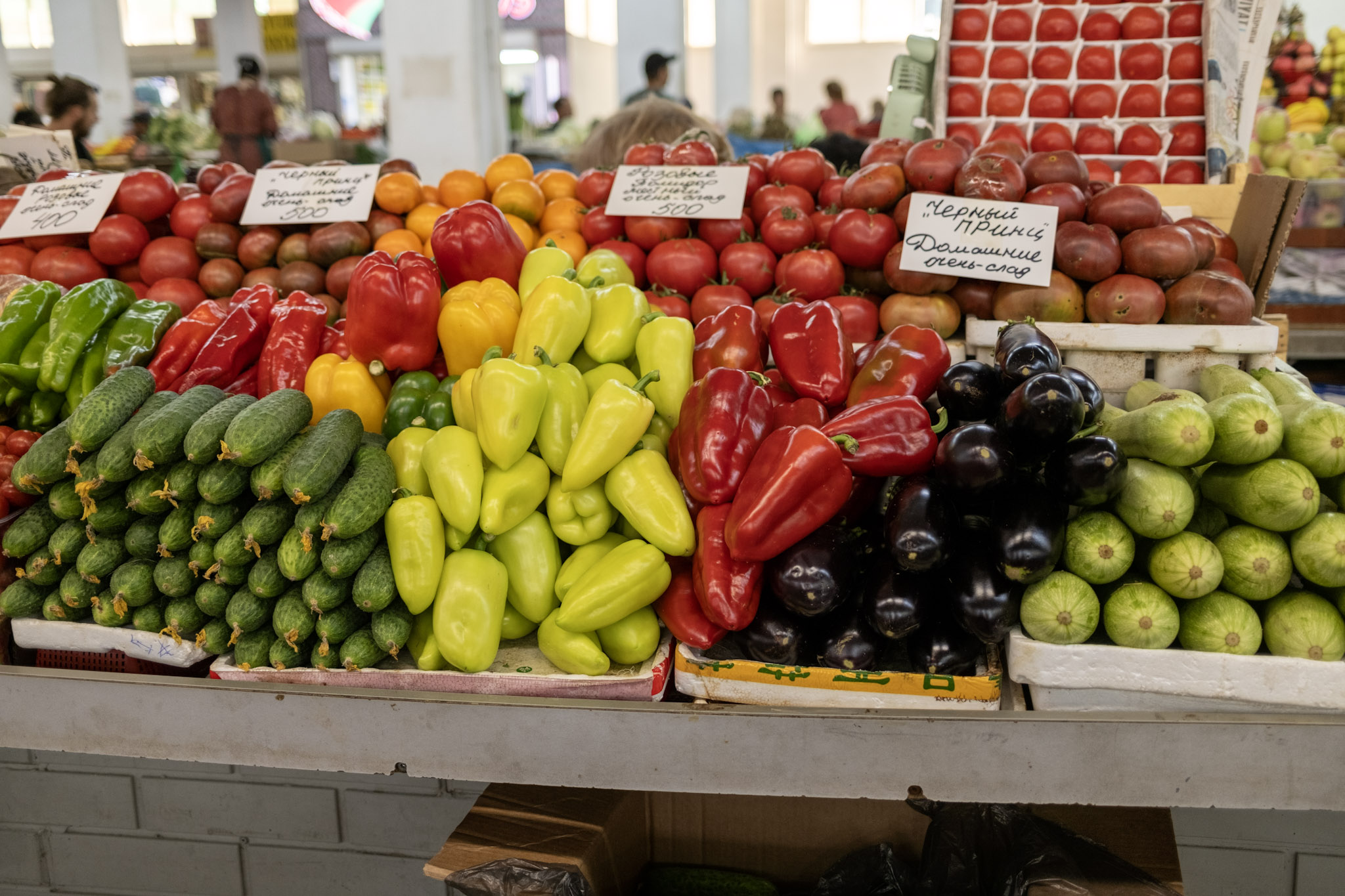 photo from the market stall with pepper, tomato and other gourds