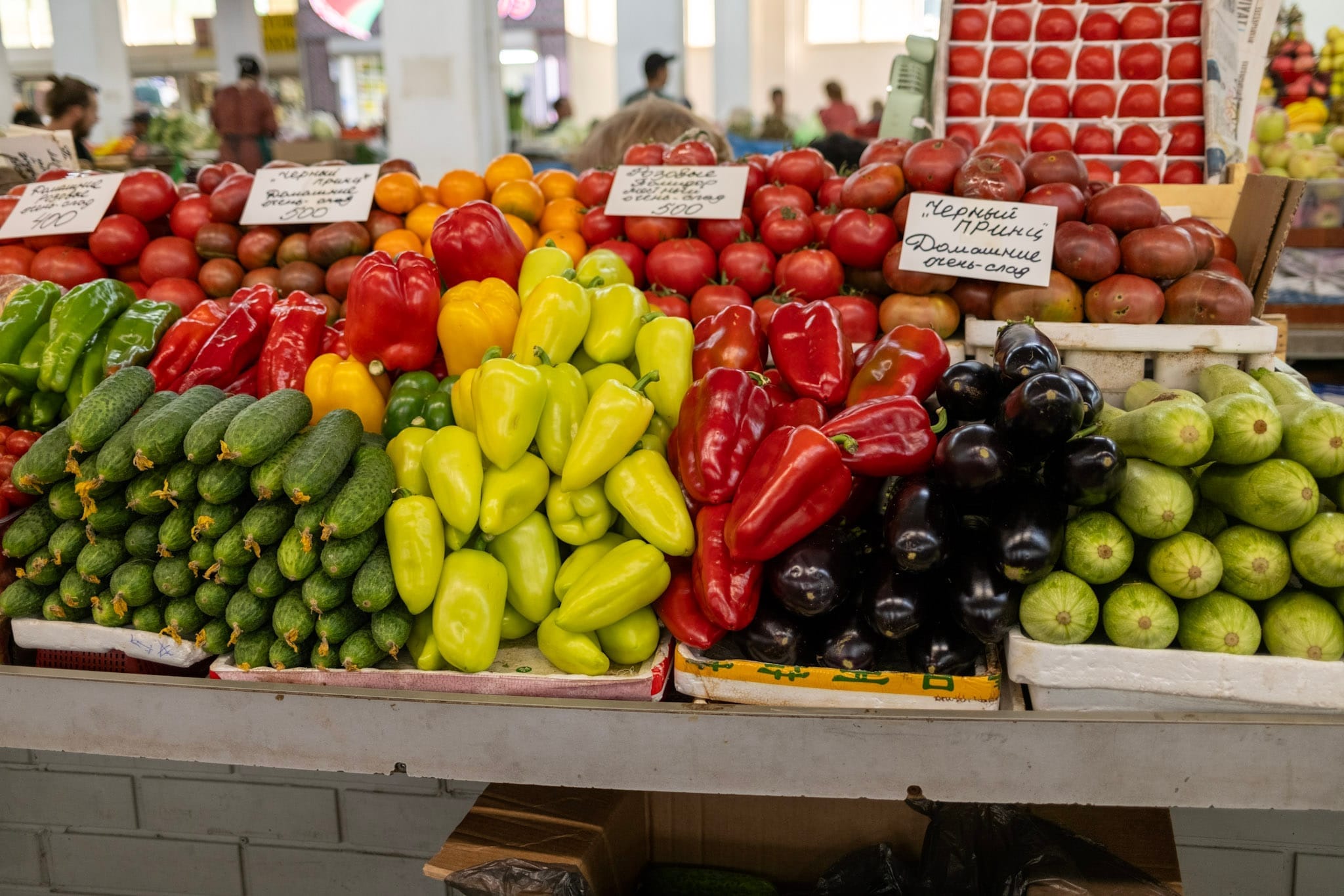 photo from the market stall with pepper, tomato and other gourds
